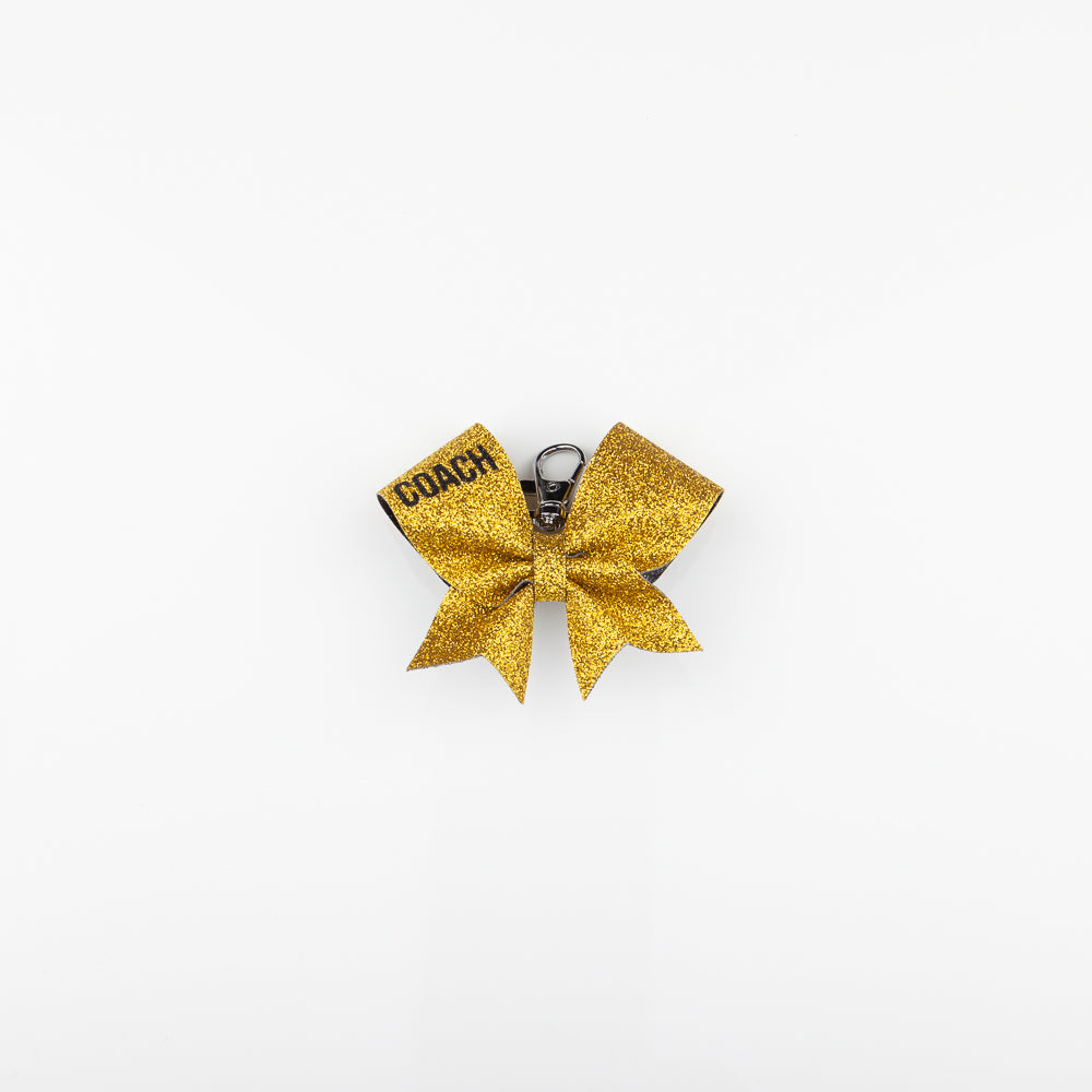 Nyckelring Bow Coach Gold
